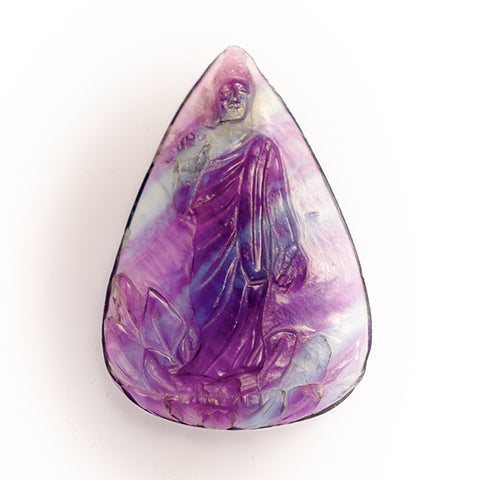 Fluorite with carved Buddha